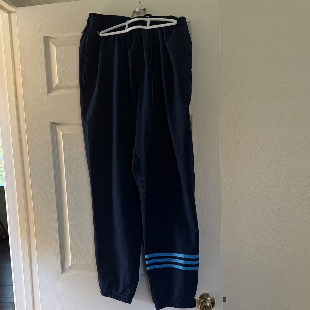 Adidas Dark Blue Track Pants with Light Blue Stripes